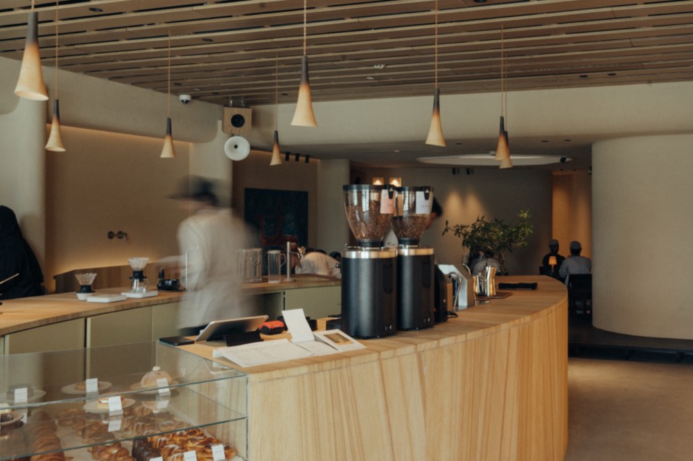Barista bar, brew station and pastry display