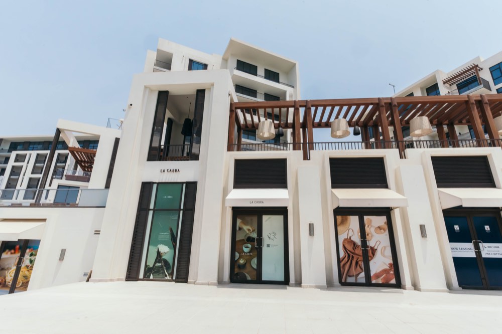 Beachfront storefront and shaded upper terrace