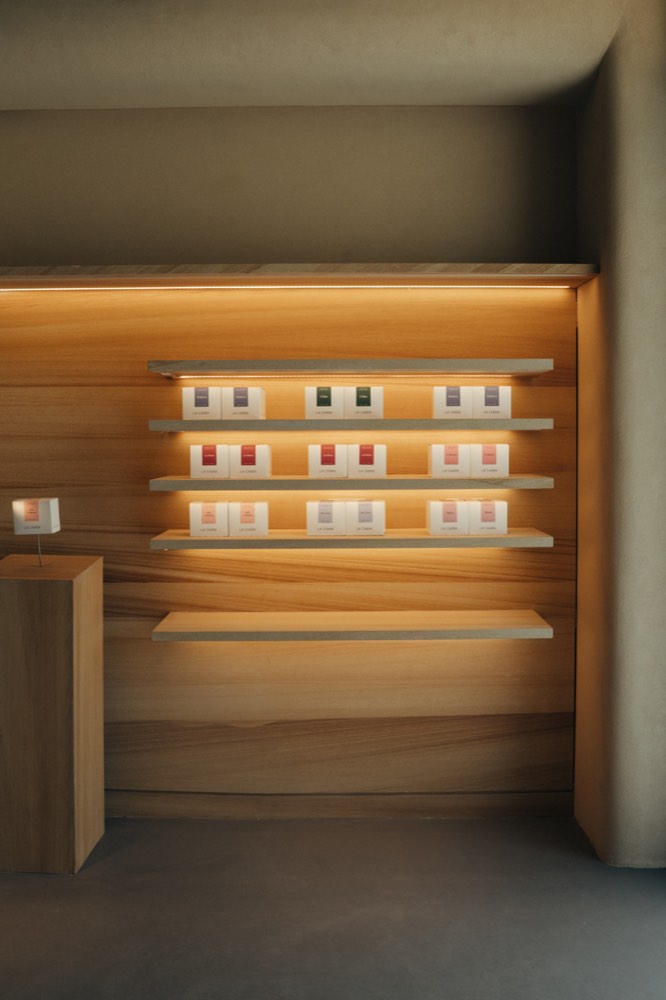 Lit oak display niche — routed shelves, hidden fixings