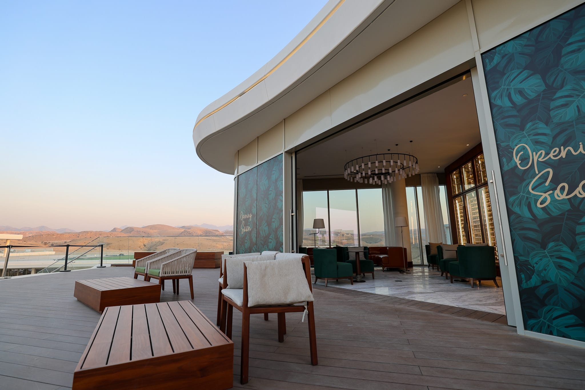 Terrace at dusk, mountain backdrop